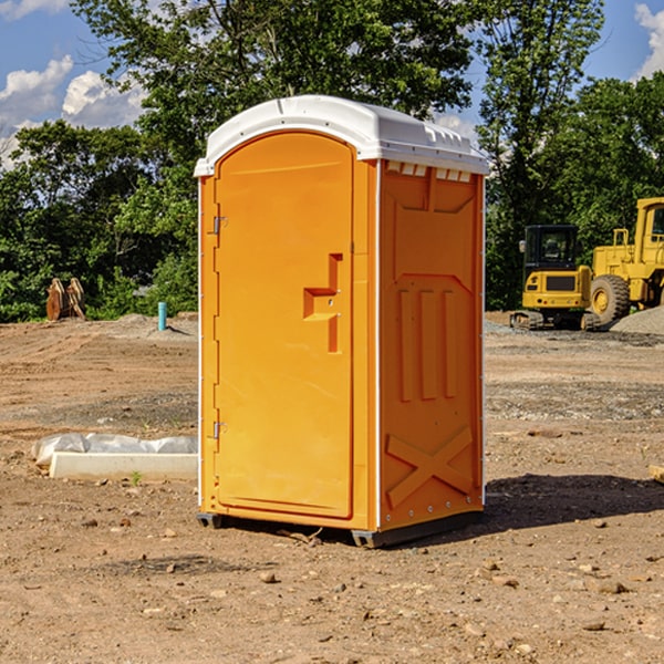 how often are the portable toilets cleaned and serviced during a rental period in Lenawee County